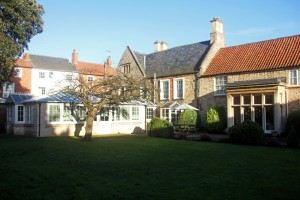 The care home gardens and conservatory